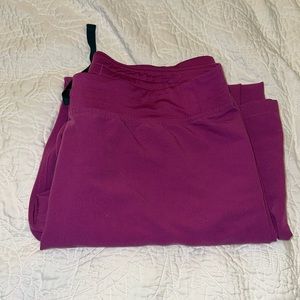 Figs women’s large petite Livingston scrub pants in fuchsia.